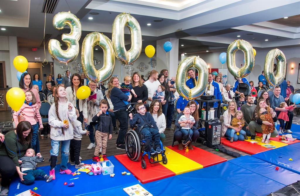 Families display $300,000 fundraising goal to audience